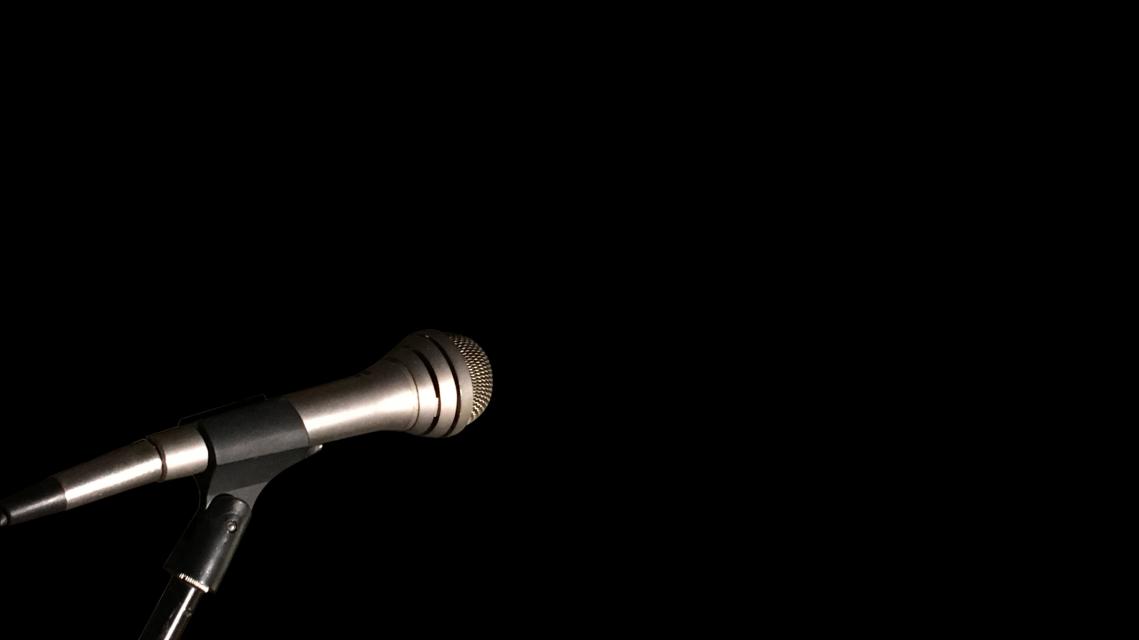 silver mic in black background
